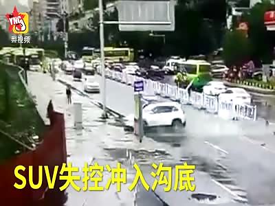 in Chongqing an out of control suv drops a woman off a cliff 