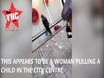 Boy dragged along the street like a Dog by woman outside TK Maxx in Liverpool, England