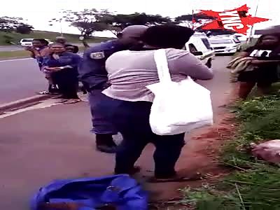 Young south african woman caught dumping her dead baby on the roadside