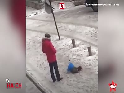 A cruel dad kicks his son when out for a walk in  Kyrgyzstan