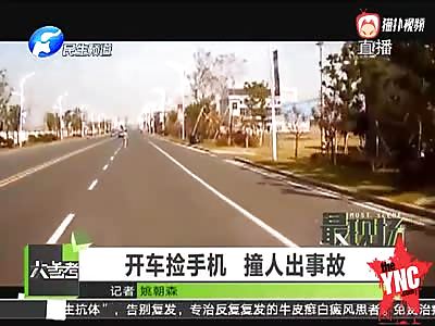 man  killed   in the middle of the road when he picks up his phone  in Yixing