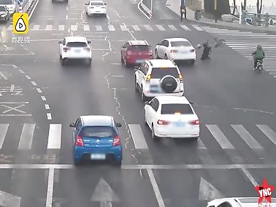  a man running a red light was hit by a fast moving car