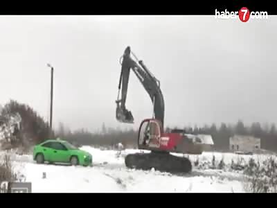 a giant excavator destoy a car in a road rage incident