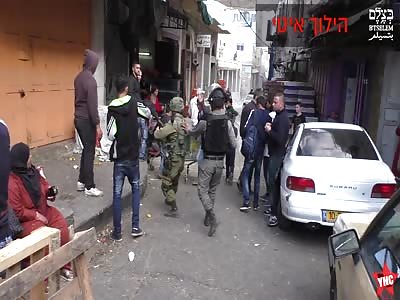 A Israeli soldier beat a 16-year-old boy in the head with a rifle barrel during a settler march in Hebron