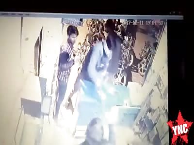 a fight at a mobile shop in Fatehabad