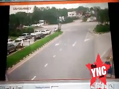 motorcycle man  get crushed under a truck  in Thailand 
