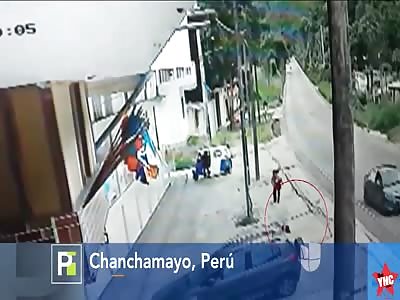 Girl went flying through the air after being rammed by a driver in Peru