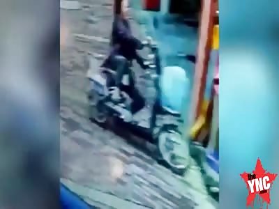 a lady on her bike has a bad accident in Guangdong