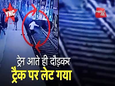 Man jumps on the tracks and thows himself under the train