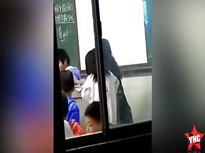 teacher gives slaps to  students in  Guangdong