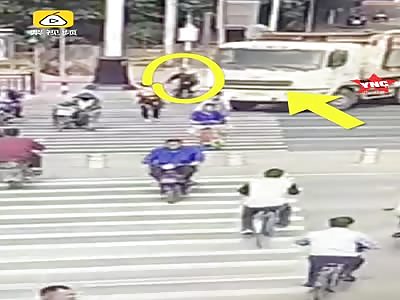 man is crushed by a  truck in   Guangdong