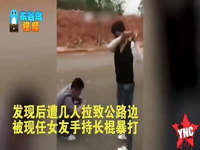  a man suspected of cheating gets hit with a stick