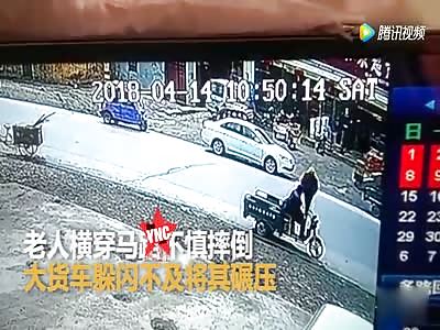 an old man accidentally fell across the road and a truck crushed him in  guangdong 