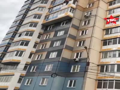  a man who fell from the balcony of a high-rise building on Alexeyev Street in Russia 