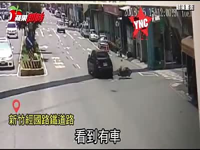 a woman who was pregnant for five months was killed by a BMW in Taiwan on   Takeshi-Kyuko Road