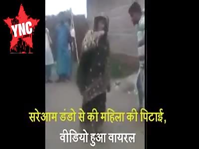 man beats woman on the street in Jaipur