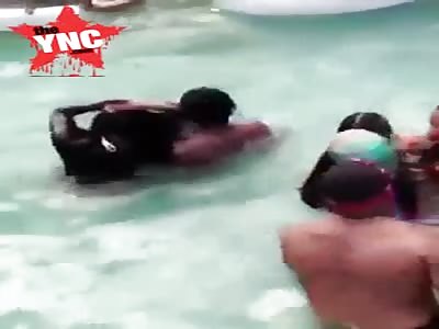 apes fighting in the pool