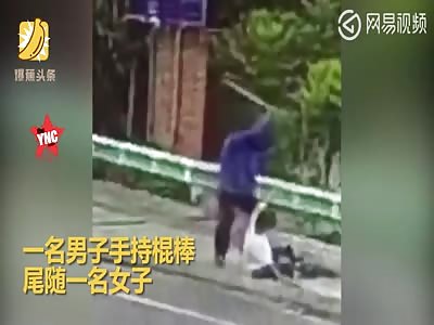 man hurts a random woman with a stick in Sichuan Xichang