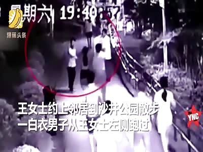 man beats up woman people just watch in Shajing Park