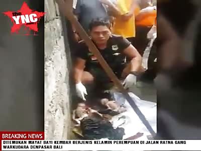 two dead twin girls  were thrown into the rubbish in bali