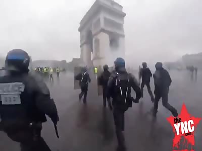 charging into battle  in the  Gilets Jaunesâ€™ or â€˜Yellow Vestsâ€™ Protest in paris