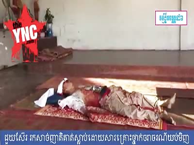 in Cambodia a dead man who was killed by a bike  body is placed waiting for  traditional funeral 