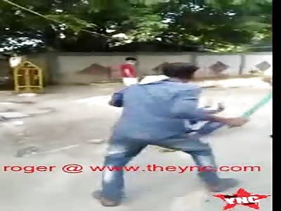 indian police officer beats muslim with stick in Delhi