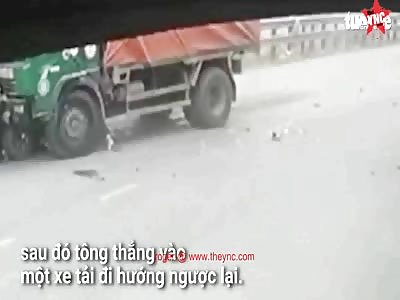man coldies his vehicle into a truck in Vietnam