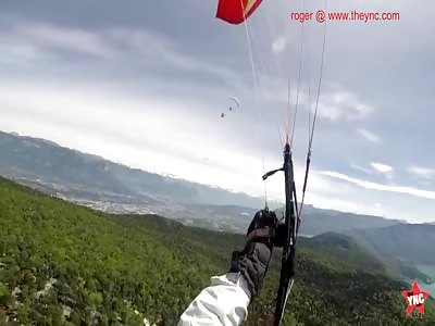 paragliders collide into each other in Aiguebelette-le-Lac, France