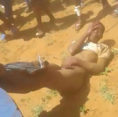 African thief Caught ,Dragged and Beaten by Angry Mob  