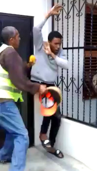 Thief being Beaten by Furious Workers