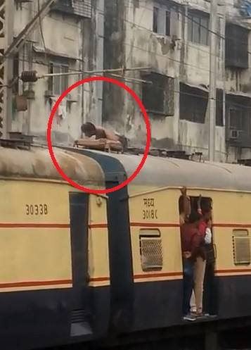 Man Electrocuted and Burning in Agony Over a Train