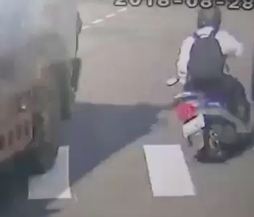 Impatient Motorcyclist tries Passing Dump Truck and ends up Killed Instantly