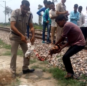 Aftermath of Suicide Carnage by Train 