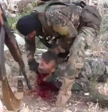 Moderate Terrorists Behead Syrian Arab Soldier