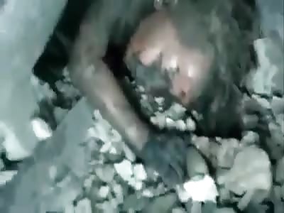 Little boy under rubble ready to die even complaining of pain
