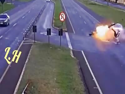 Car accident crashes motorcyclists and explodes motorcycle tank