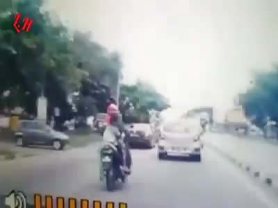 Boy gets stuck on motorbike