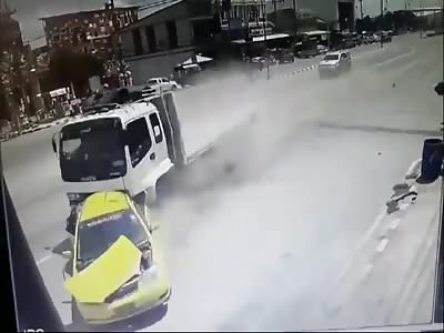 Truck rear ends taxi at high speed killing passengers.
