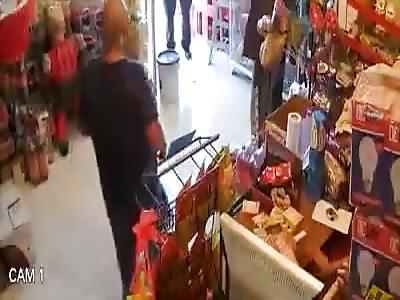 Man attempting to loot store gets shot by cop.