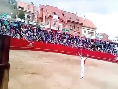 Man tries to jump a bull and gets knocked out.