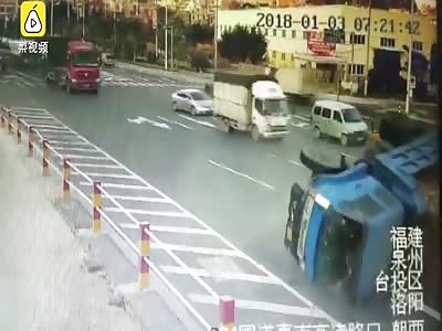 Unlucky woman hit by a car then crushed by a truck.