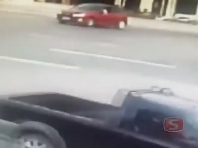 Motorcyclist smashes into a car