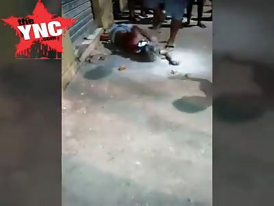 Thief is beaten with sticks