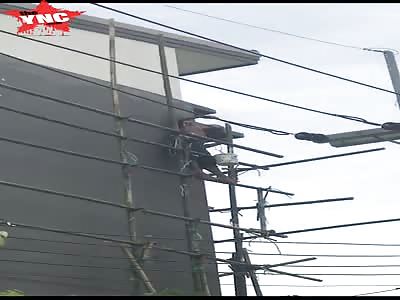 Worker is electrocuted to death then falls to the ground