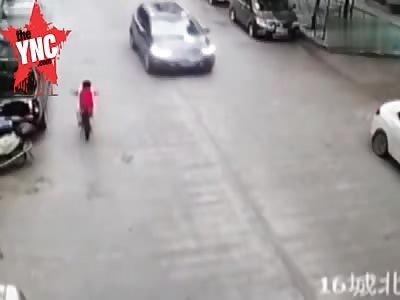 Kid gets run over by a car