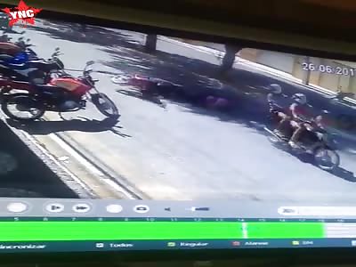 Woman pulled off her motorbike by bag-snatcher