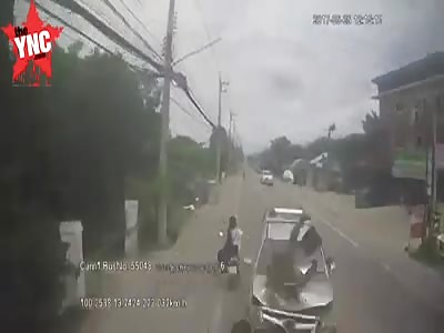 Close up of motorcyclist hitting car head on and getting crushed against a bus