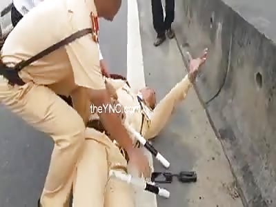 Cop goes into convulsions after being hit by a car