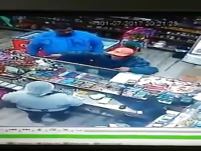 Man punches and throws out a thief trying to rob a store